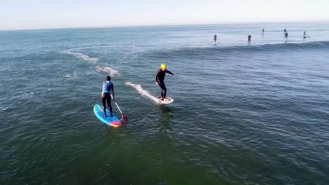 aerial wake surfer hydrofoil wakefoil floating hovering over atlantic sea
