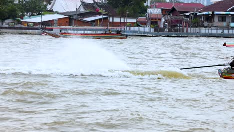 a vibrant boat speeds along a bustling river