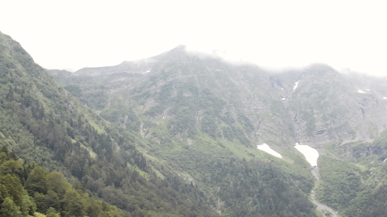 Panning shot of mountains in Artiga de Lin