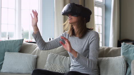 woman at home wearing virtual reality headset shot on r3d