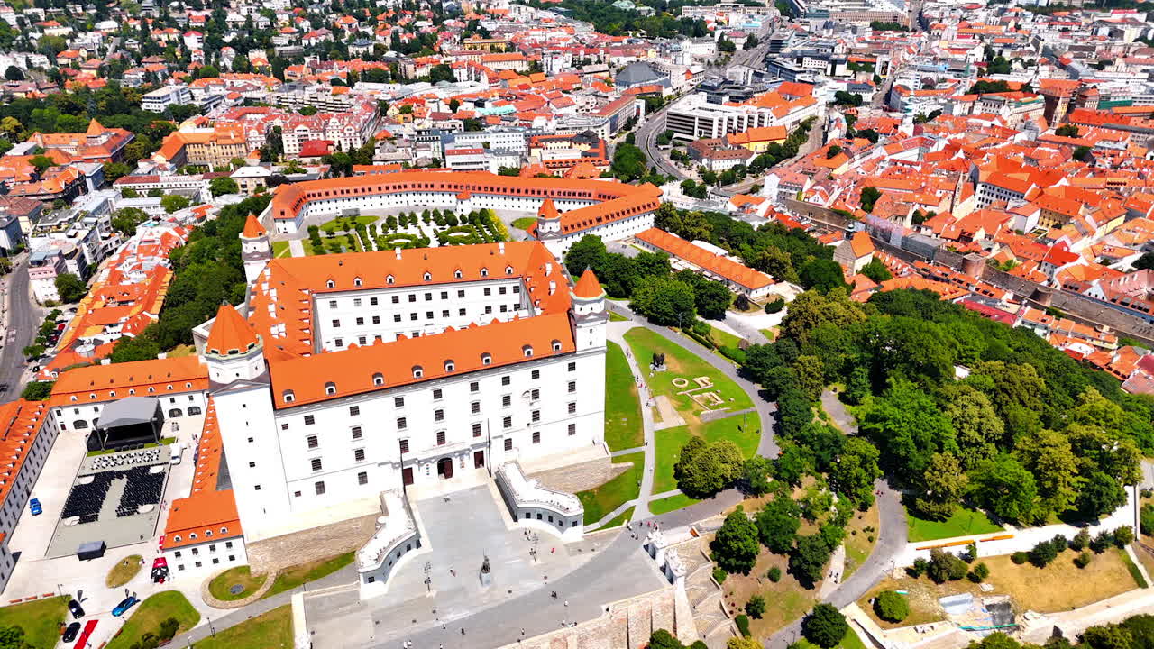Distancing from the Bratislava Castle surrounded by the greenery. View on the historical part of the city