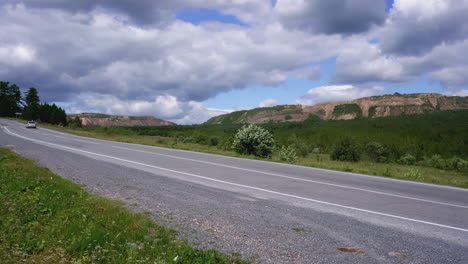 country road through scenic landscape