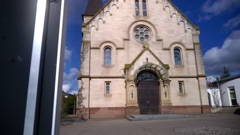 Cathedral-in-Stuttgart,-Germany-near-sign,-closer-angle