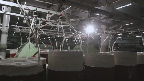 process of manufacturing thread on automated spinning machine