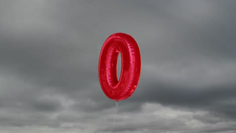 animación de un globo rojo número cero sobre el cielo en el fondo.