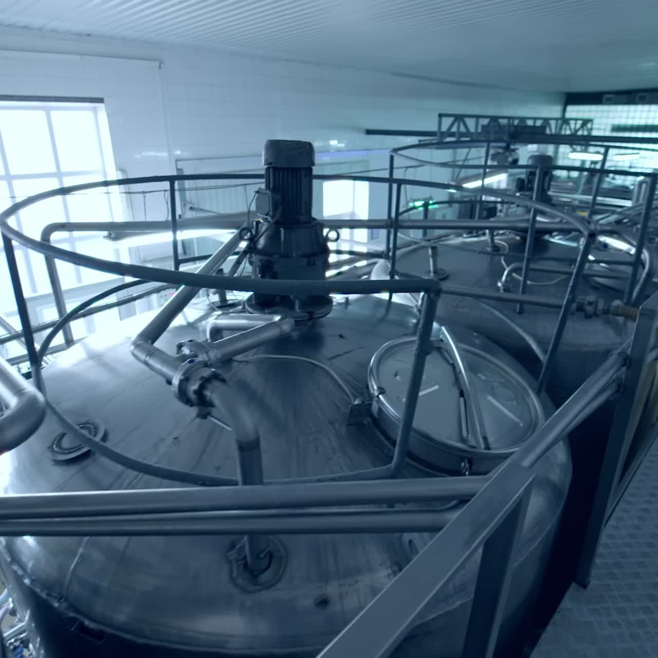 Milk production plant. Milk production technology in a large specialized farm. Agriculture production factory. Modern equipment on dairy plant