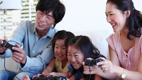 family playing a games console together