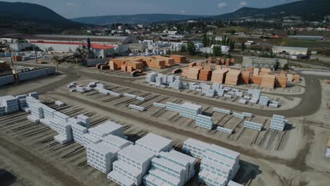 drone stacks of boards sawn at the sawmill lie outdoors canada