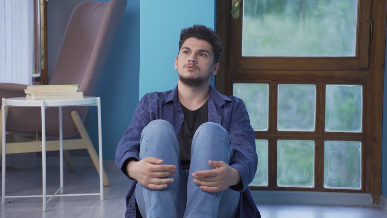 Paranoid guy pretending someone's coming.