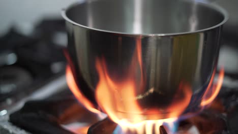 metal pot on the stove fire