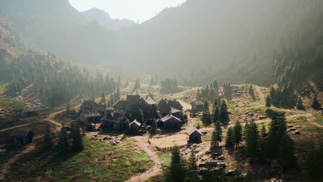 old wooden village on the rocky mountain background