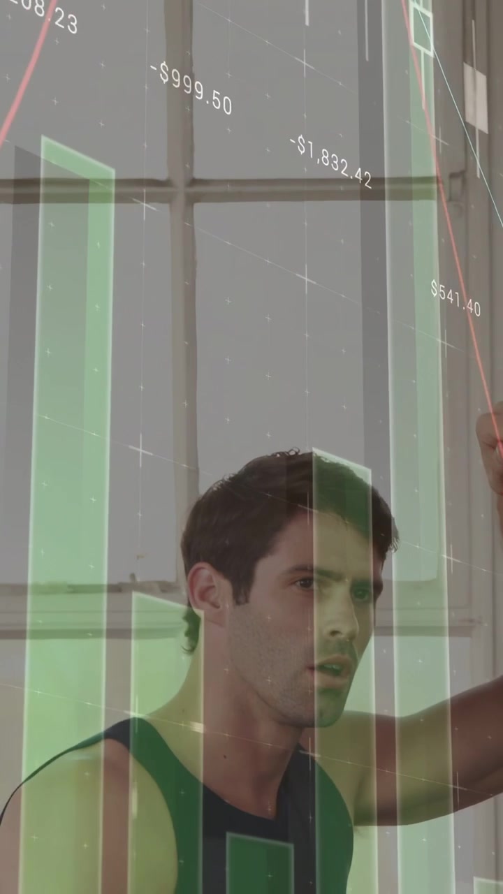 Vertical video: Man gripping bar and pulling up, training while finance graphics overlaying torso