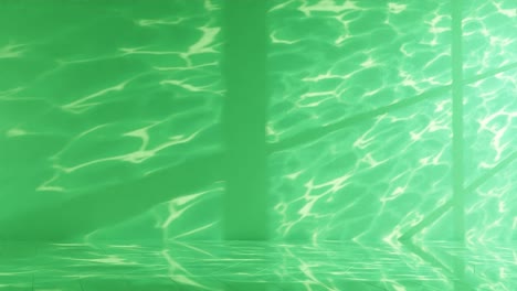 serenity in green: light patterns on a pool’s surface