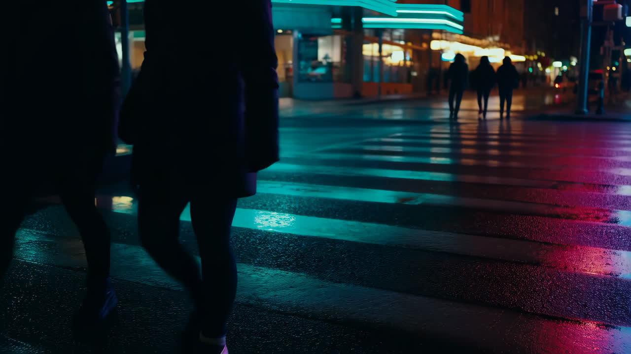 Urban Night Scene with People Crossing a Wet Street