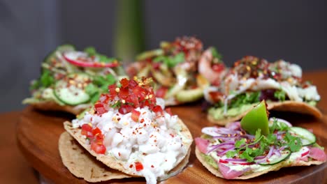 mexican tostadas seafood shrimps spinning putting dressing on top