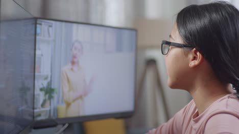 woman attending an online coding class