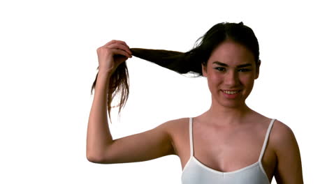 Woman-letting-down-her-ponytail