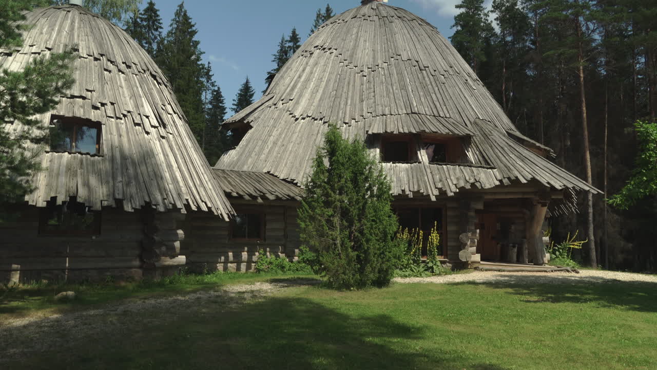 Pokuland houses in south Estonia. Summer, sunny day, blue sky.