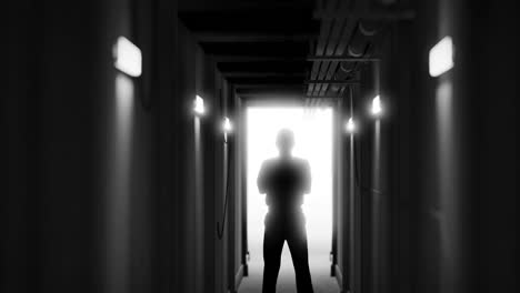 animation of man silhouette standing in dark corridor