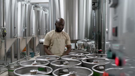 man posing at the factory