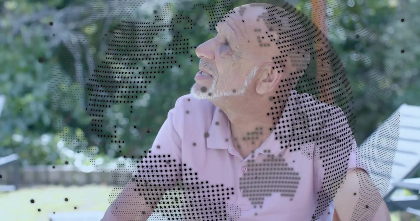 Senior man sitting at table scanning sky spotting object with dotted technology map overlay