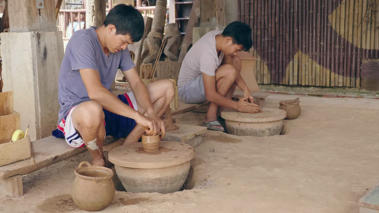 Two Men Working On Pottery Wheel, Video In 4K