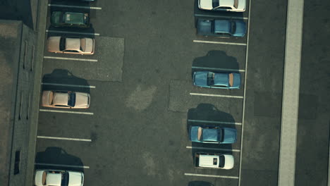 crowded parking lot with many parked cars