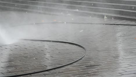 pressure washing a city street