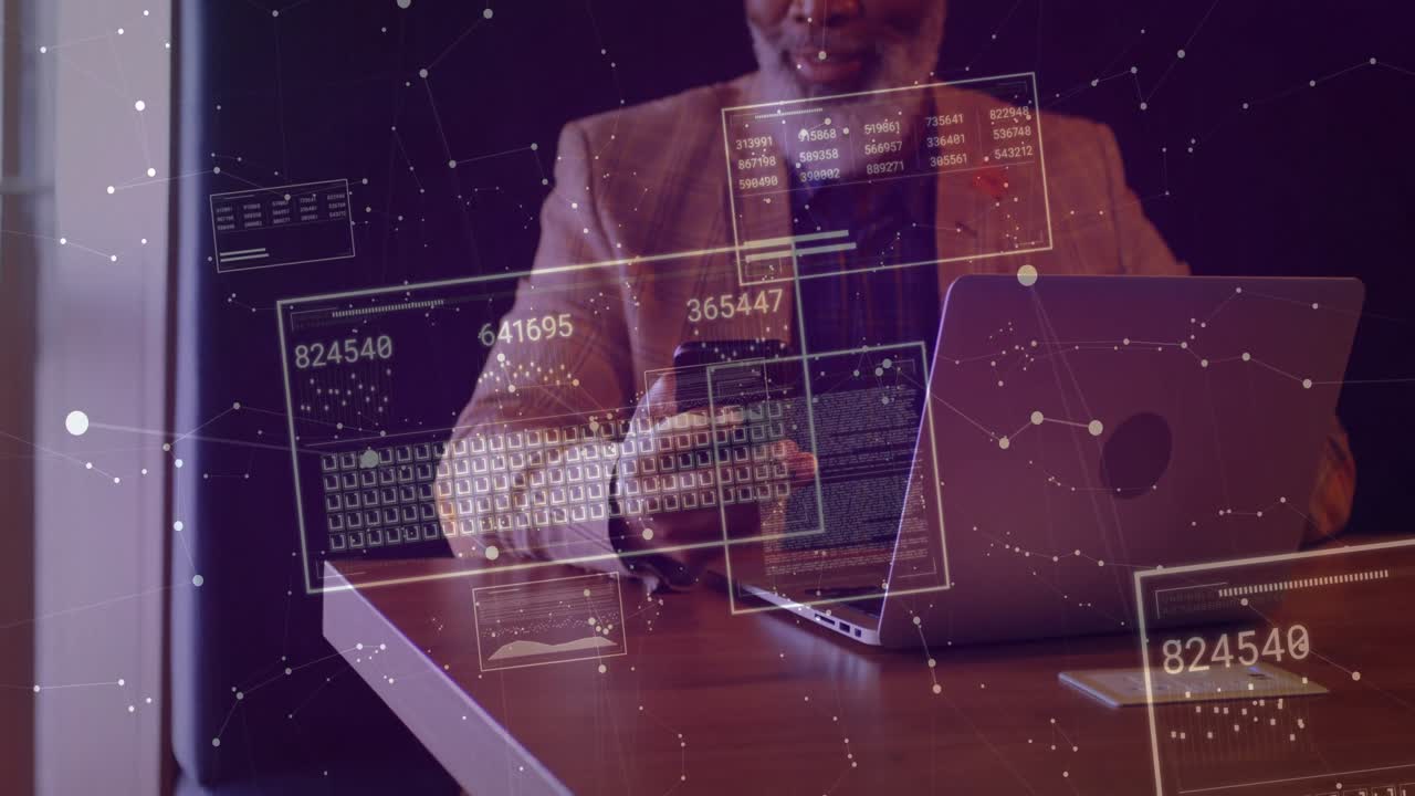 Business professional placing phone beside laptop, tapping phone while viewing finance data panels