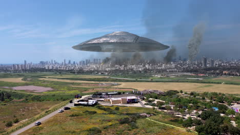 alien spaceship hovers above city under attack