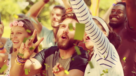 animation of confetti falling over people dancing and cheering during music concert