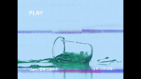 animation of screen with glitch over falling glass with green reagent