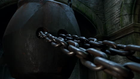 heavy metal chain and counterweight in a stone structure