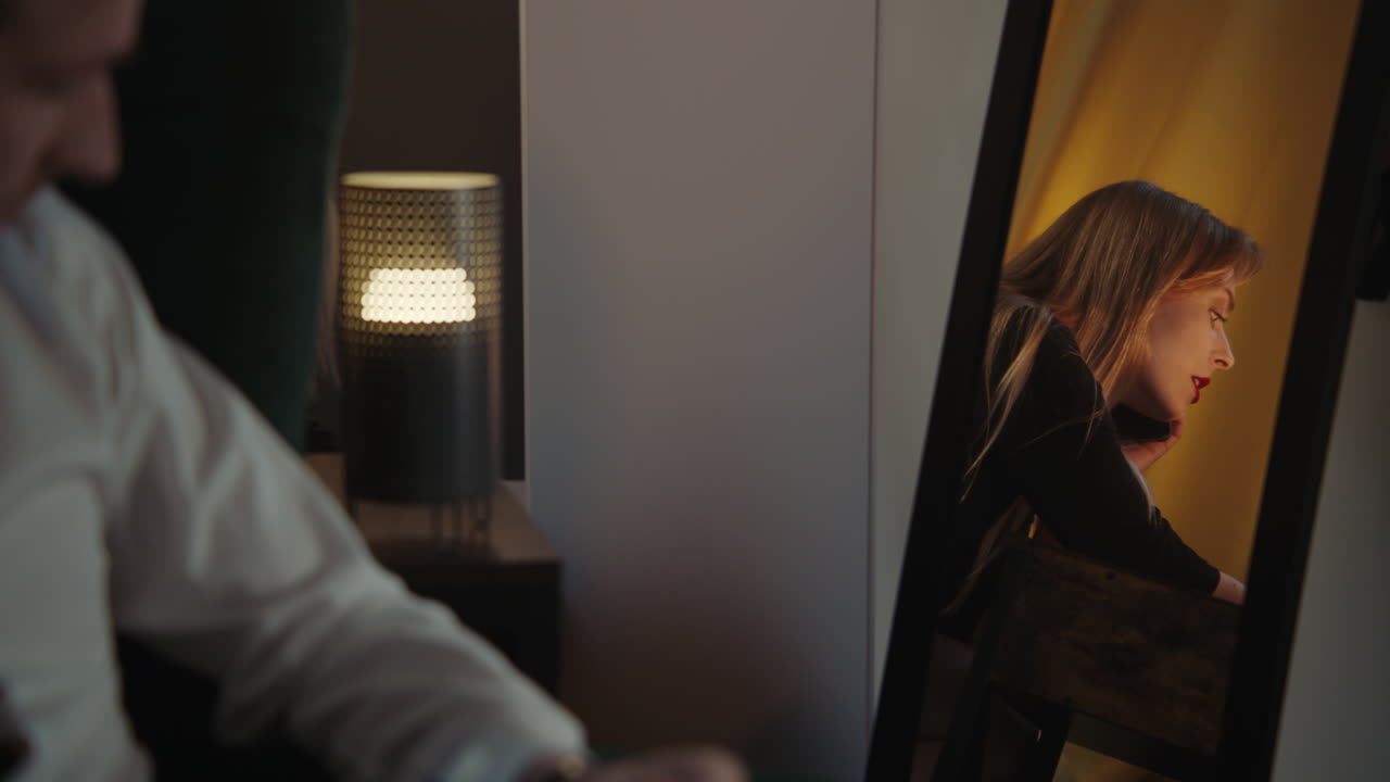 Couple's intimate moment in the bedroom