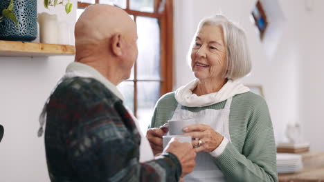 Senior-couple,-laughter-or-coffee-in-conversation