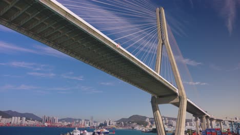 busan harbor bridge, arriving in south korea establishing shot