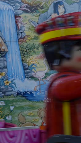 vibrant cartoon jungle mural at an amusement park ride