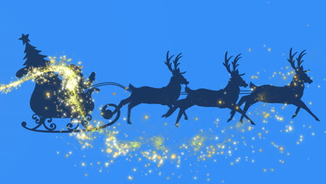shooting star over silhouette of santa claus in sleigh being pulled by reindeers on blue background