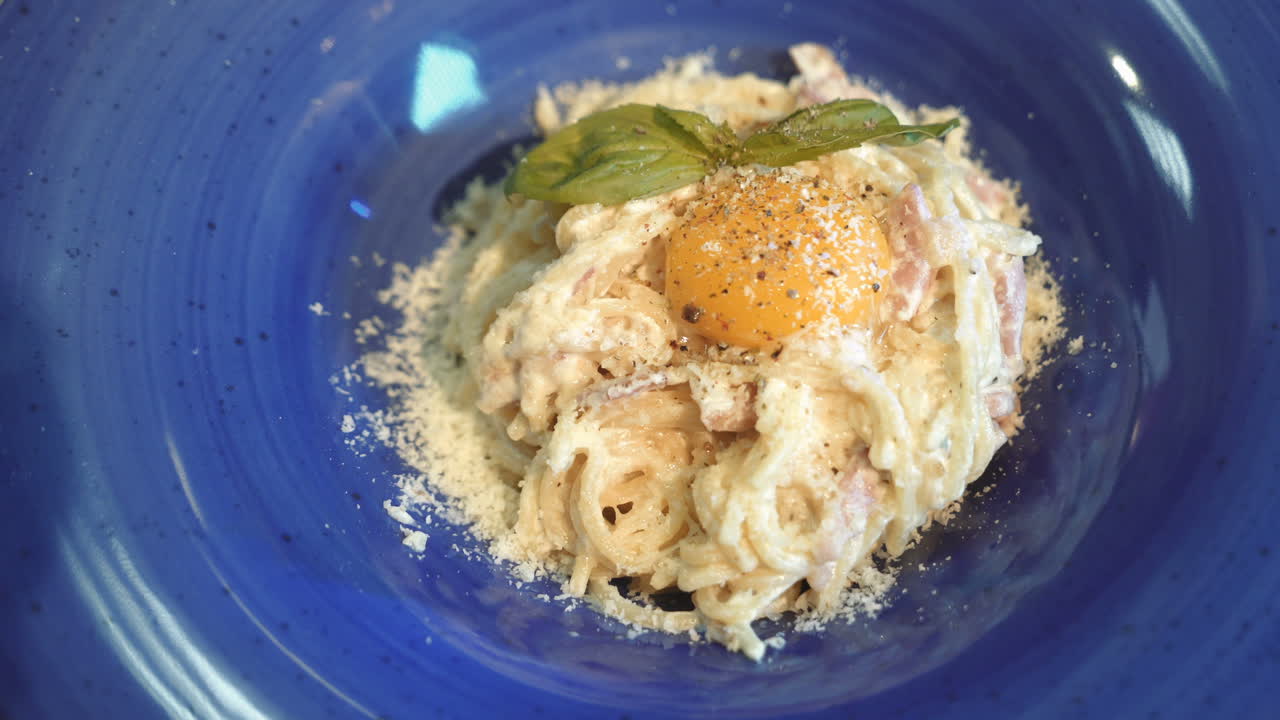 Pasta Carbonara with parmesan and yolk. Italian Cuisine.