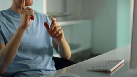 Manager-hand-waving-video-conference-closeup.-Focused-team-lead-talking-online.