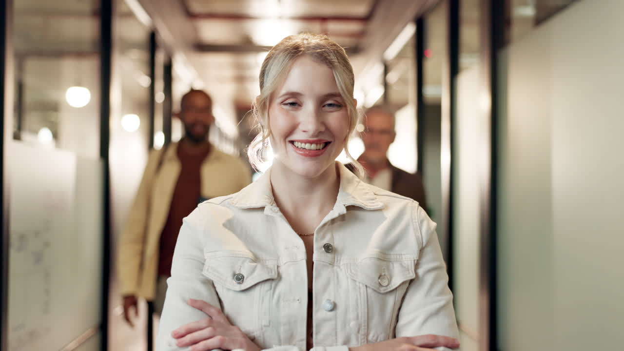A confident businesswoman smiles in the office