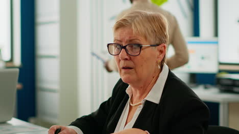 portrait of senior businesswoman looking at camera