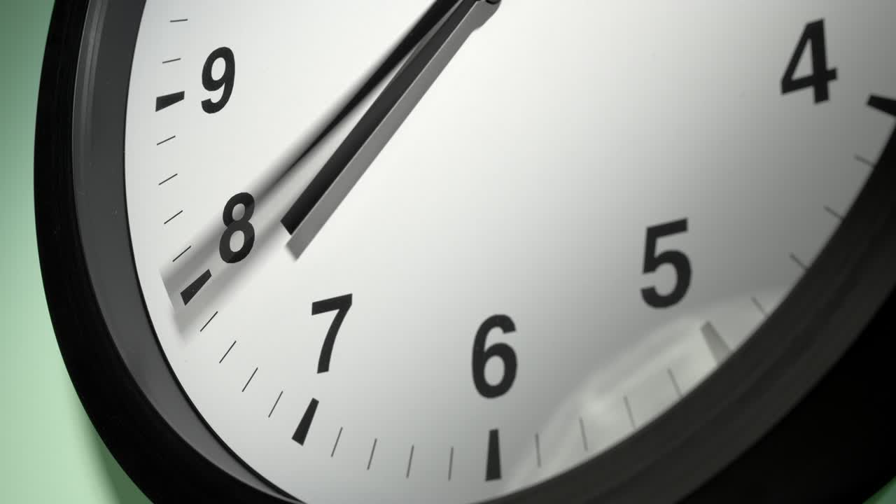 Clock Face on Light Green Wall in Time Lapse