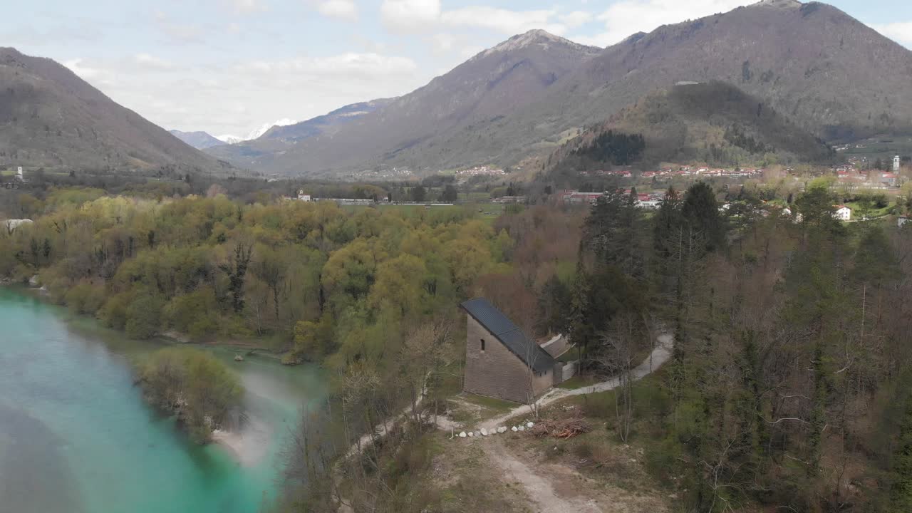 german charnel house in tolmin near soca river, aerial shot on sunny summer day