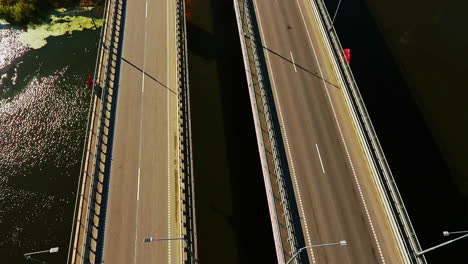 car bridge over river. drone view of highway bridge above river
