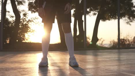 Close-Up-Footage-Of-A-Female-Athlete-Legs-In-White-Golf-Socks-And-Sneakers-1