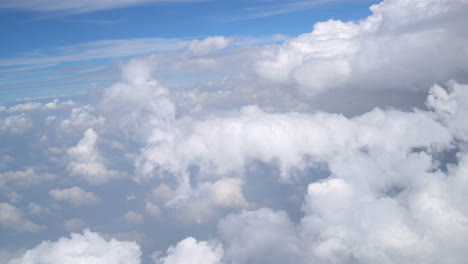 white cloud from airplane window passenger.