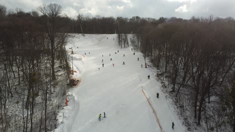 Skiing-sport,-winter-snow.-Trees-in-forest-covered-with-show.-Cold-winter-snowing-weather.-Skiing-resort.-Ukraine,-Kiev