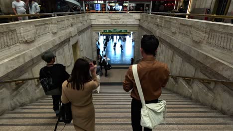 subway station staircase with people