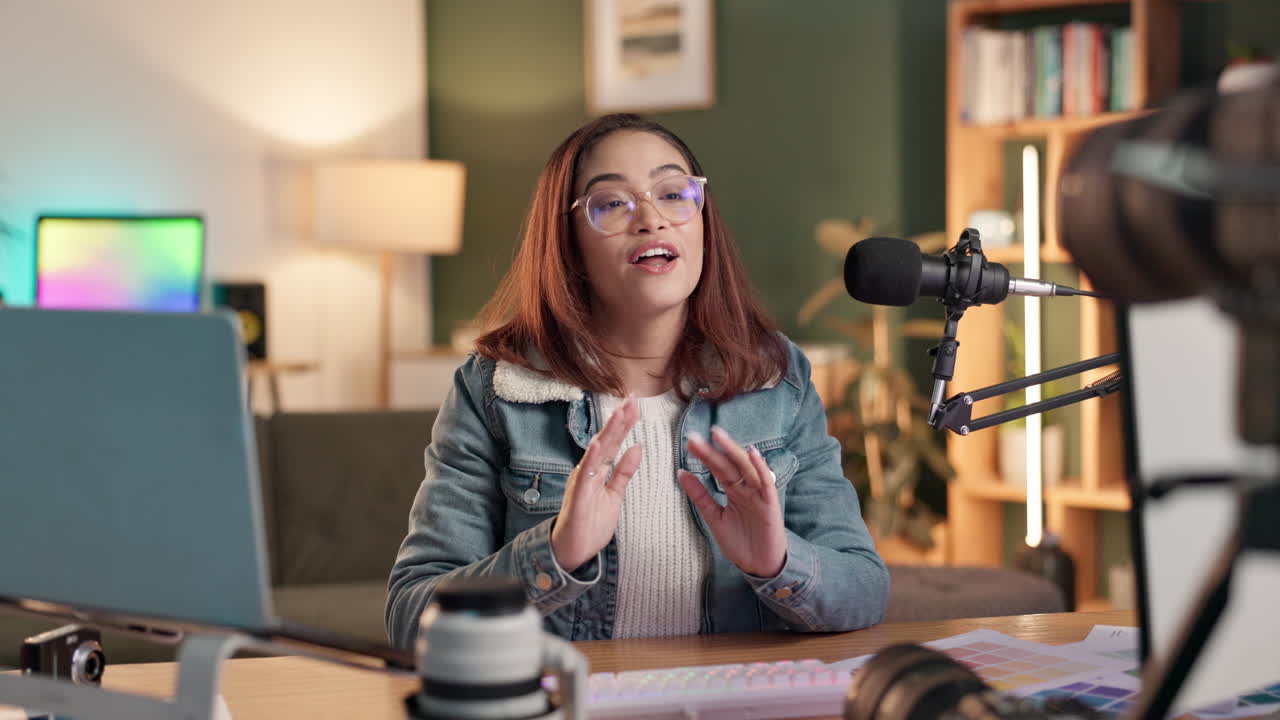 A woman recording a podcast or video blog